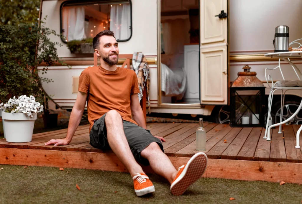 Man relaxing on lawn furniture